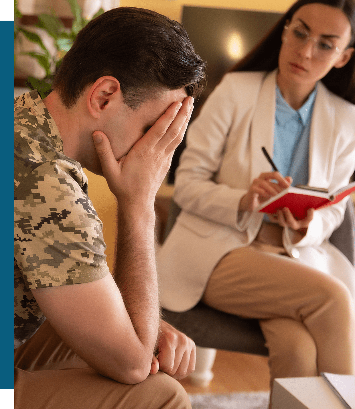 A soldier talks to a therapist in a counseling session.